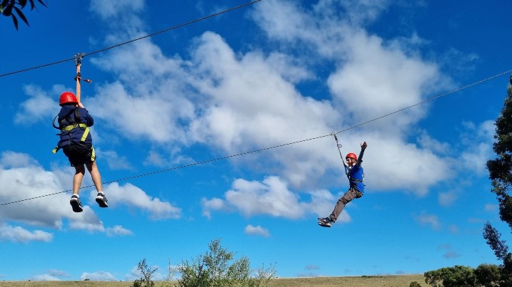 young people on flying fox