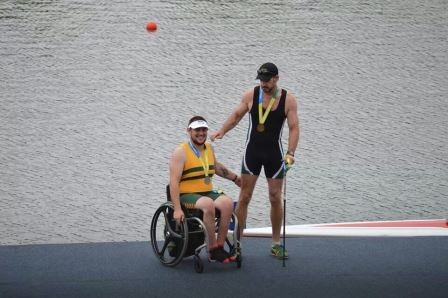 Joe receiving medal for rowing