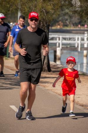 Father and son running