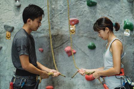 boy and girl at climbing wall - Photo by Allan Mas from Pexels