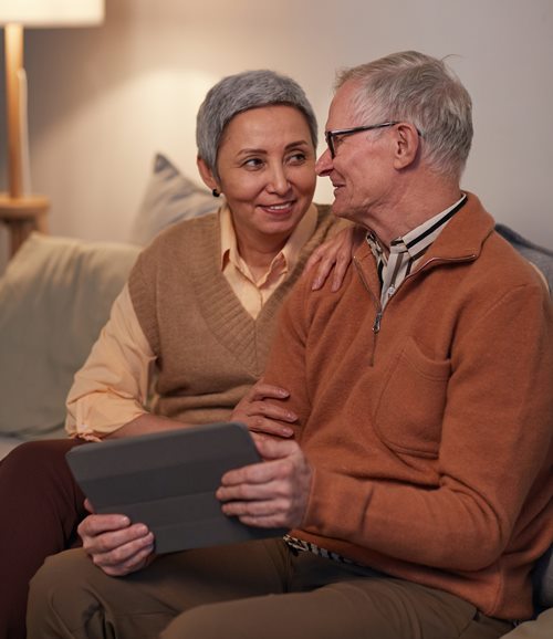 older couple on device - Photo by Marcus Aurelius from Pexels